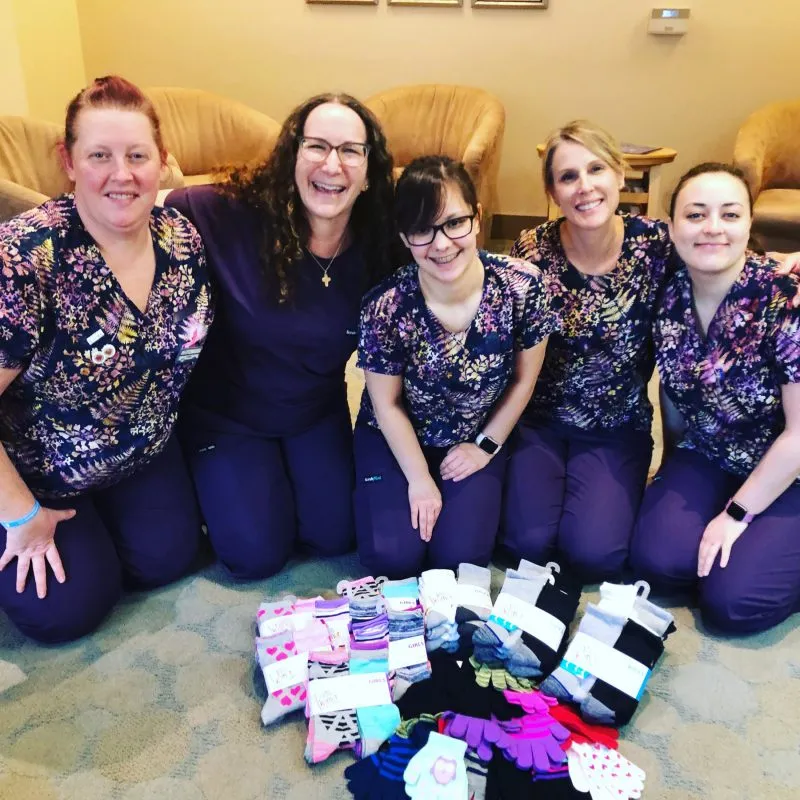 Doctor Geisler's office staff collecting for the Pink Eraser project