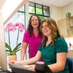 Dr. Geisler and staff working